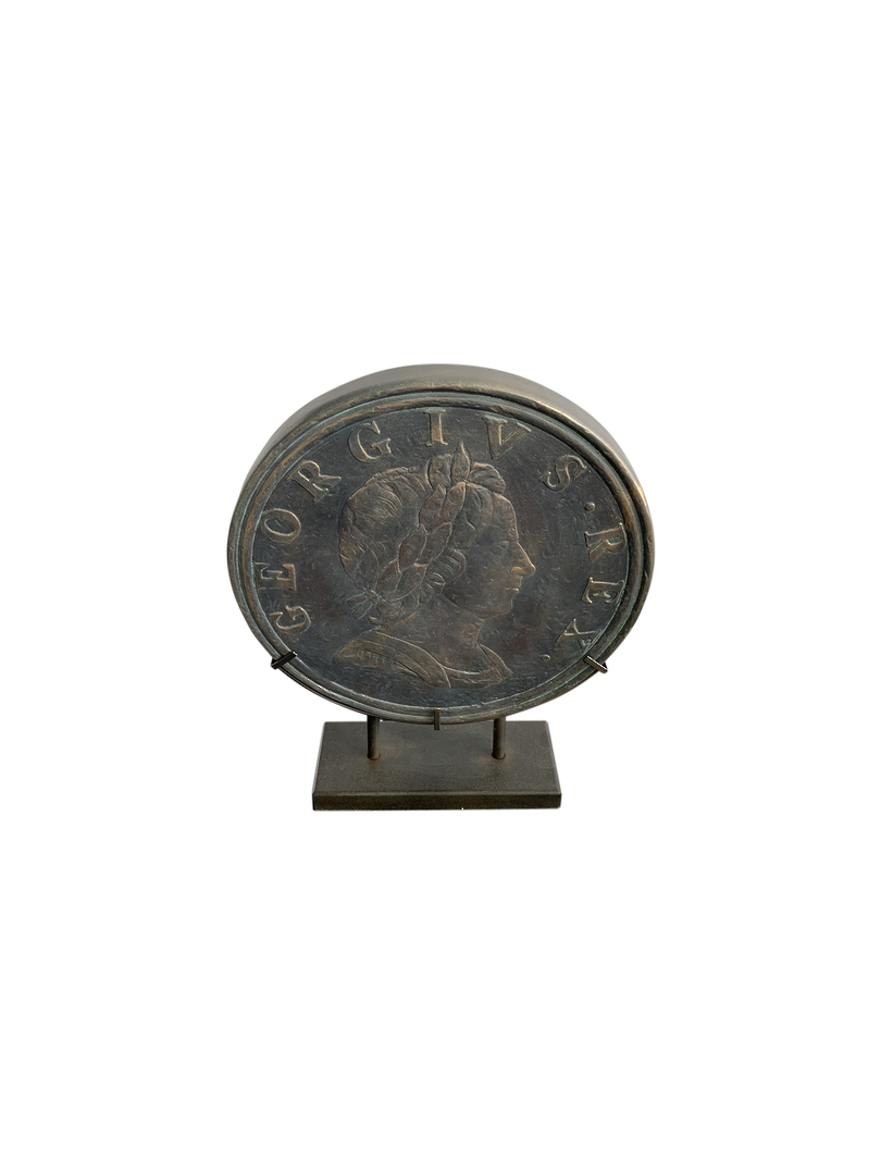 ANTIQUE OLD COIN ON STAND image 2